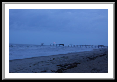 Sun Peeks Up Over Hatteras Pier